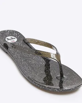 Black metallic jelly flip flop sandals