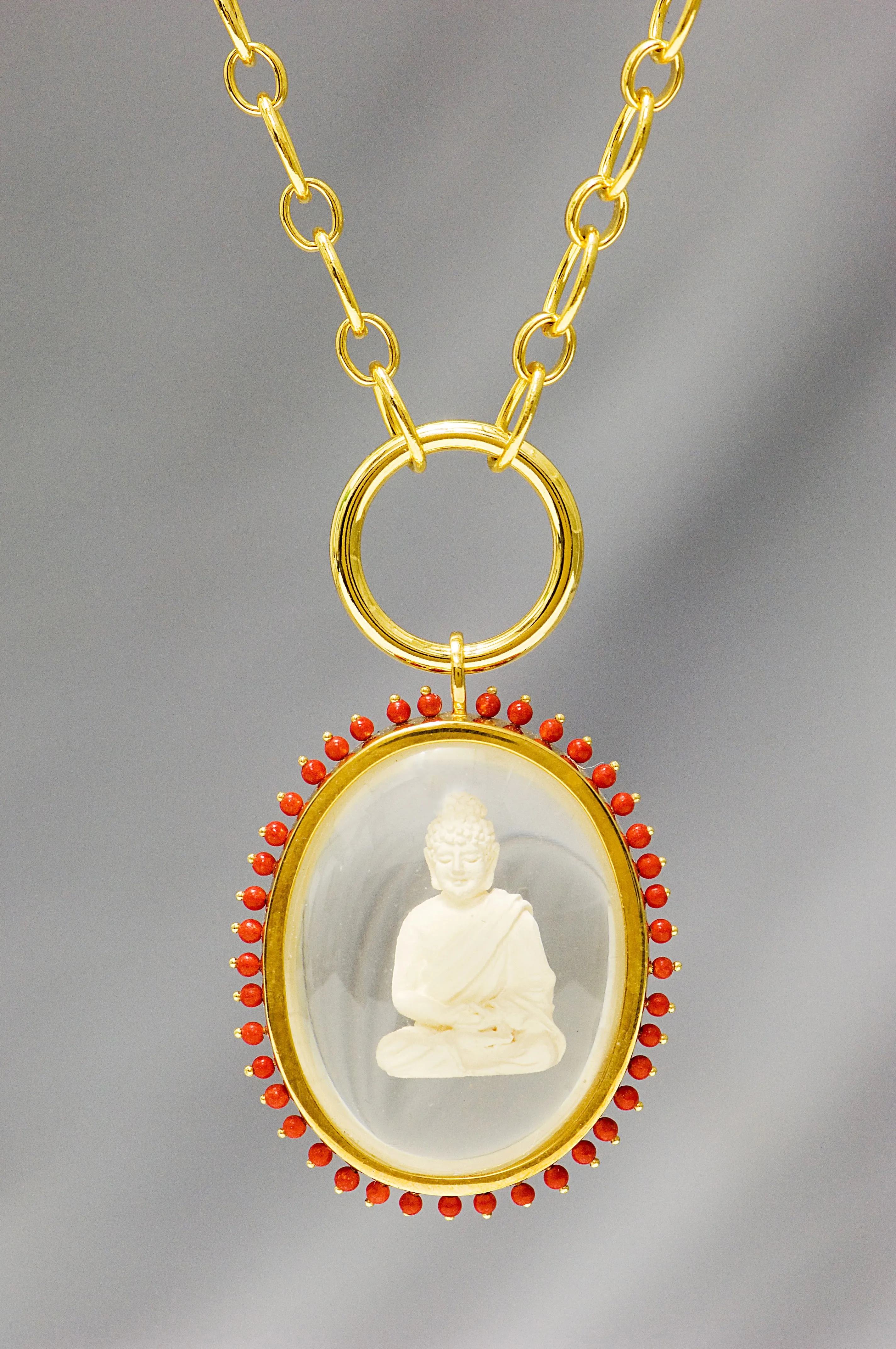 Buddha pendant with stones