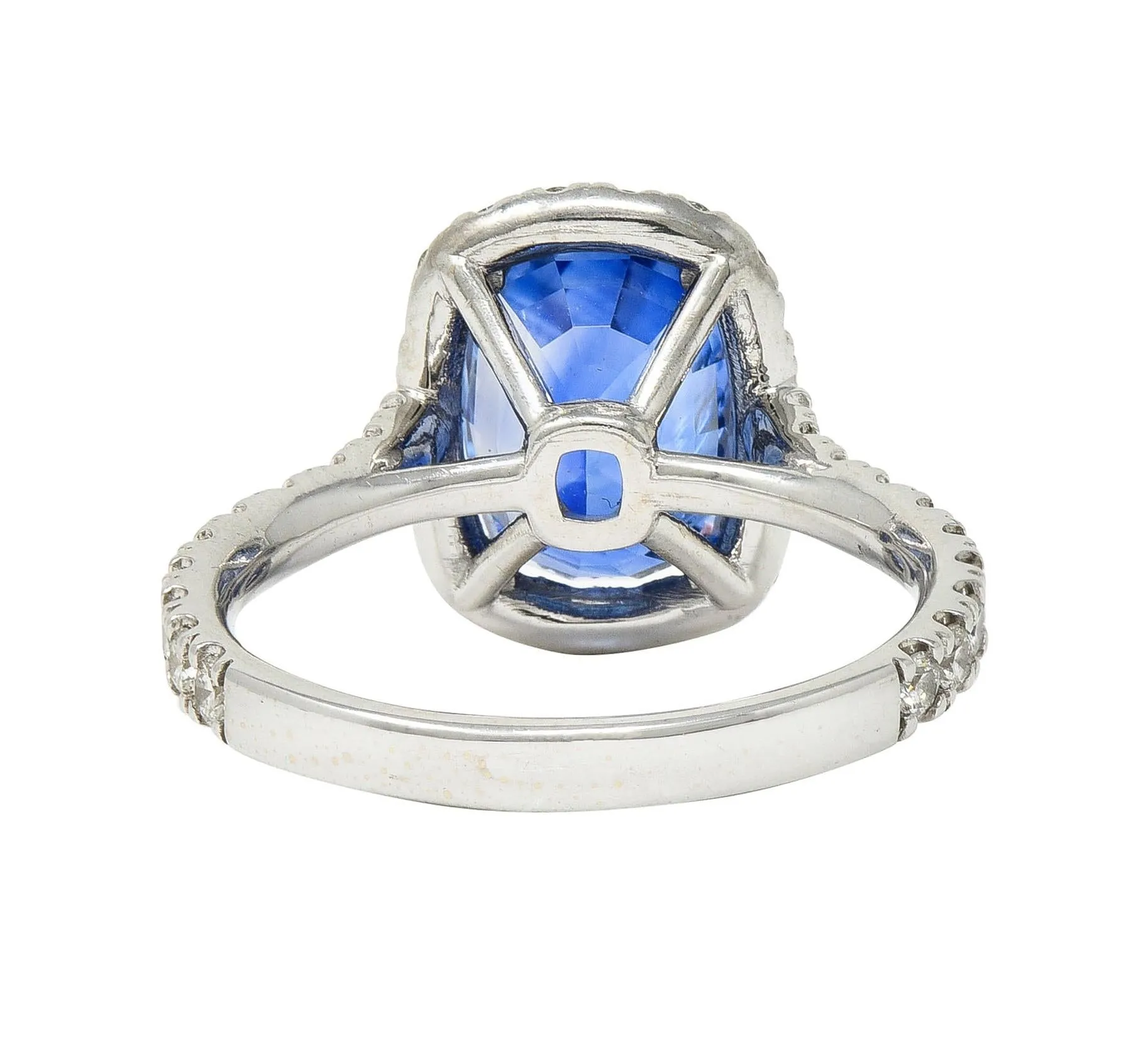 Contemporary 4.67 CTW Sapphire Diamond 18 Karat White Gold Halo Ring