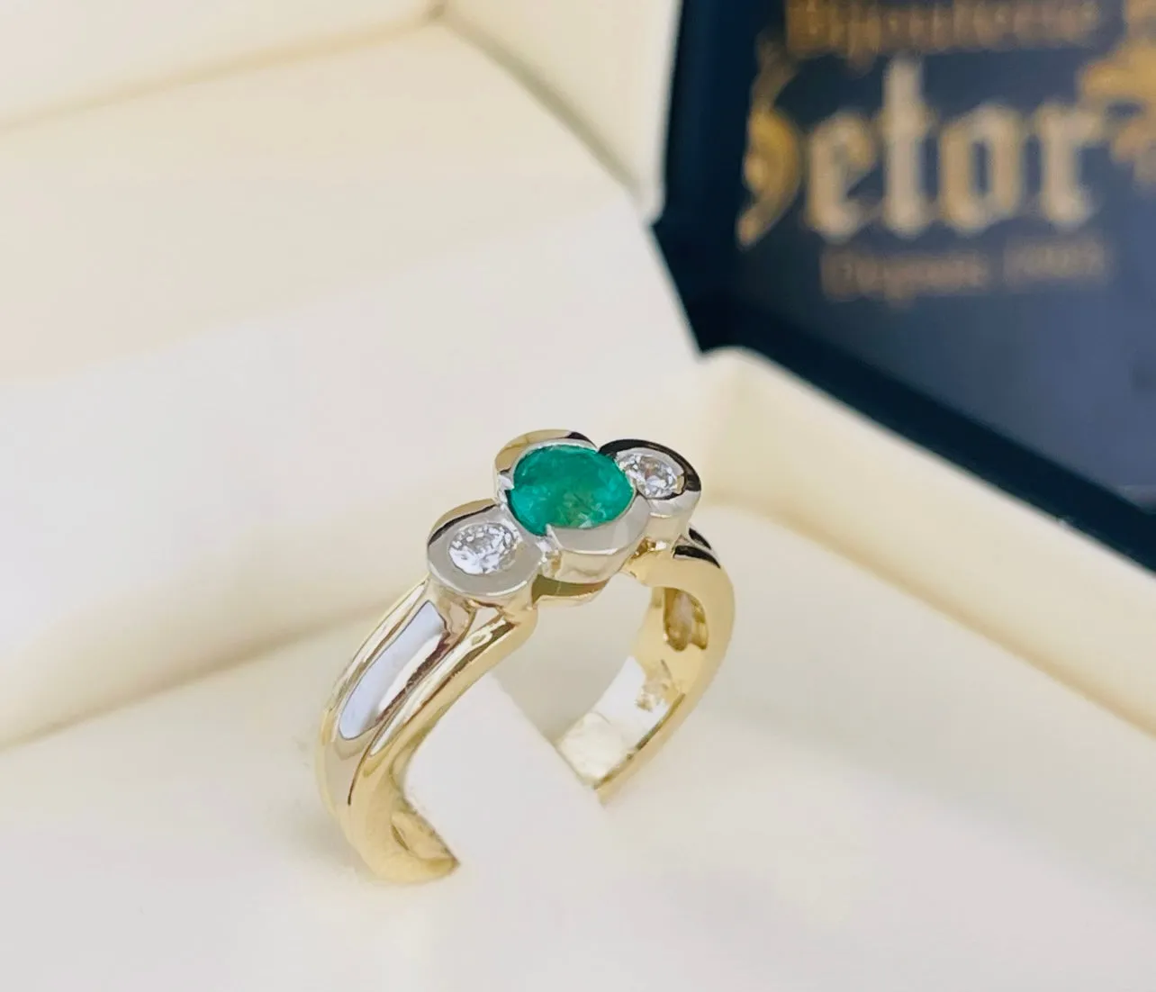 Emerald and diamond ring