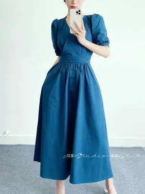 Huajia studio new 2024 summer commuting V-neck high waist peacock blue solid color pullover backless short-sleeved long skirt