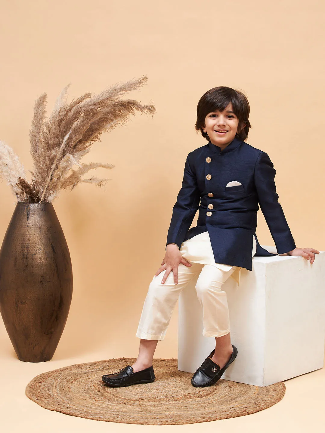 VASTRAMAY Boy's Navy Blue Indo Western Jacket With Cream Kurta And Pyjama Set